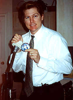 Kevin making campaign buttons.